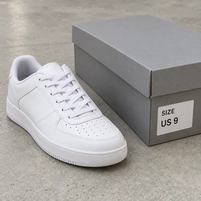 Sneaker and shoe box with a size label reading US 9
